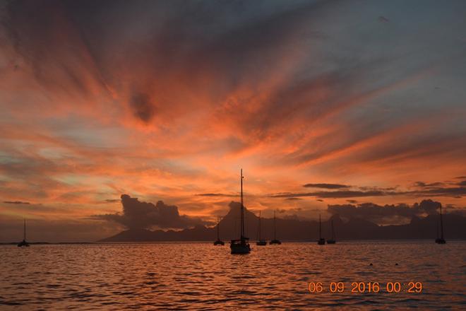 Sunset over Moorea from Taina Marina anchorage © Andrew and Clare Payne